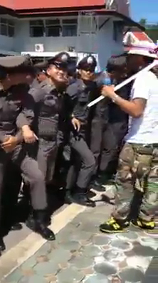 playing-with-cops-dick-during-Thai-protest-5.png