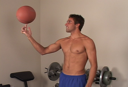 Seth spins the basketball on his fingertips